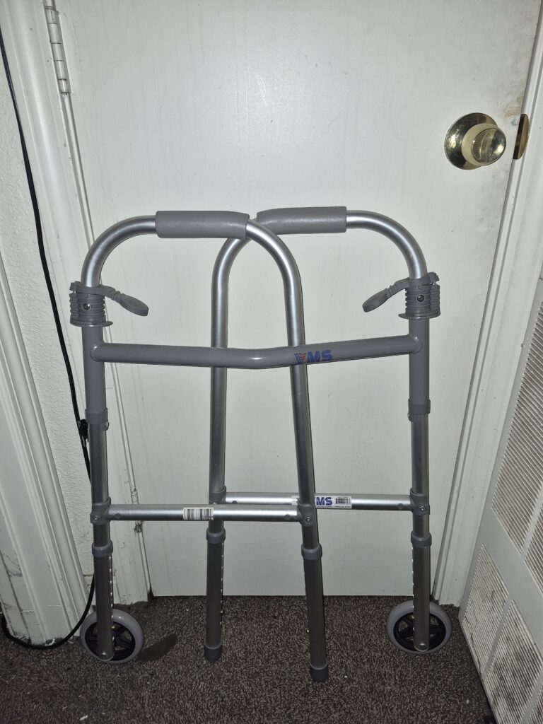 Walker with wheels foldable